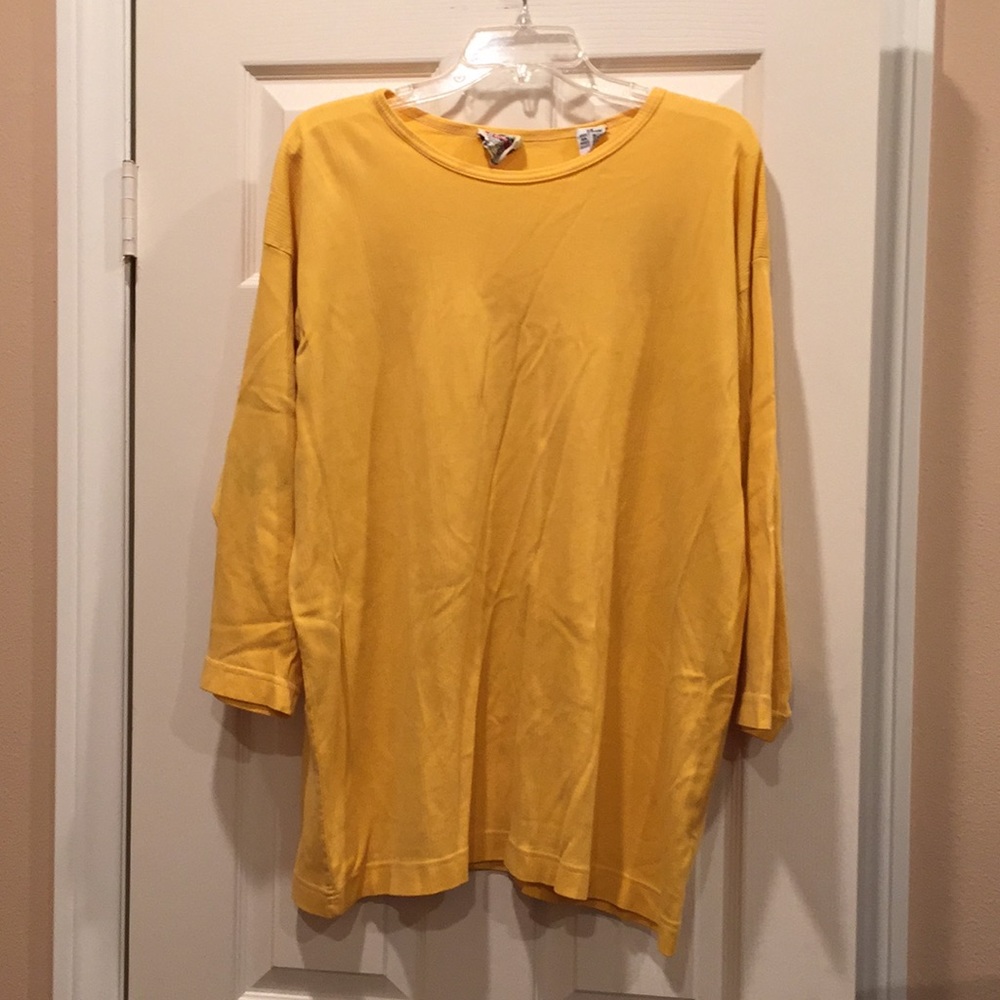 Extra Touch International top